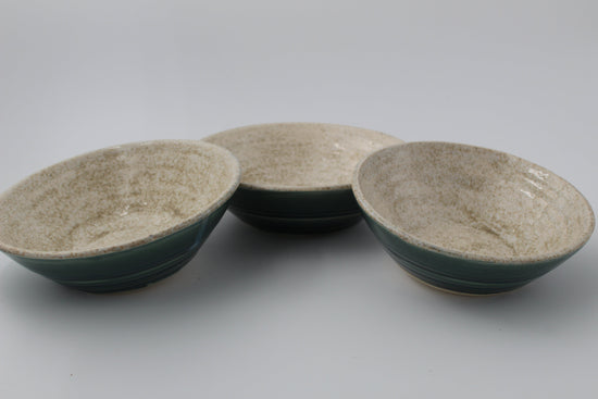 Three speckled nesting bowls