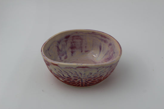 Oblong pink carved bowl