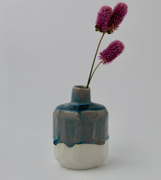 Faceted bottle vase