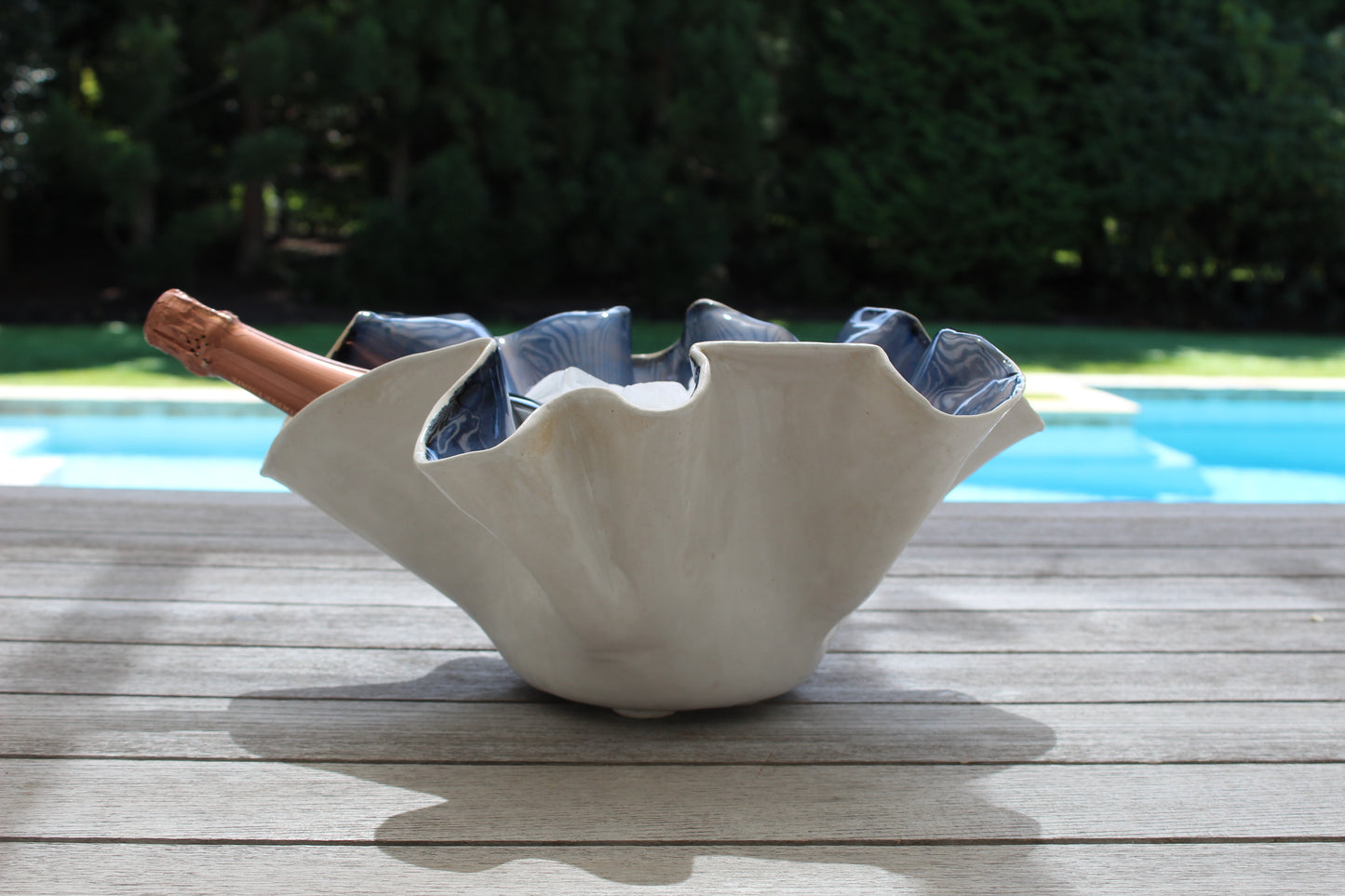 Large shell shaped ceramic ice bucket with scalloped edge 